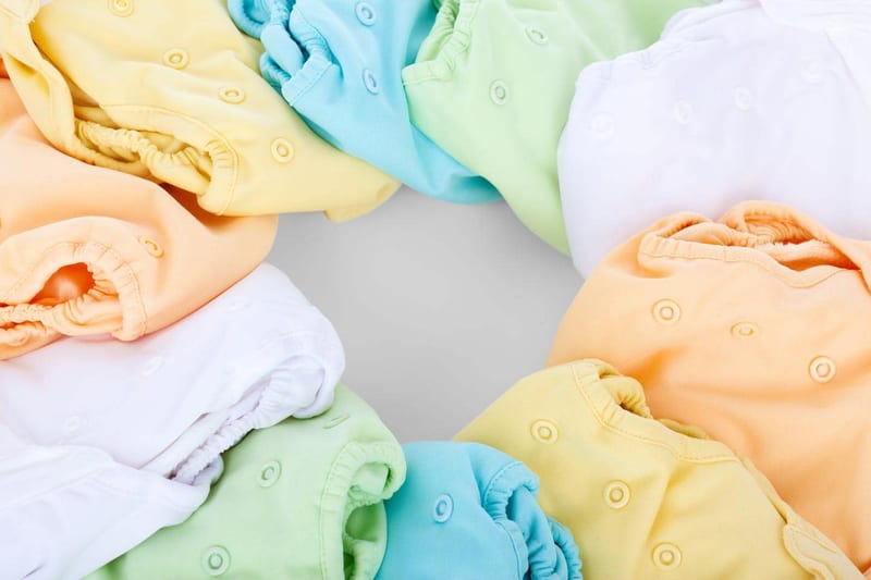 a bunch of diapers are stacked on top of each other