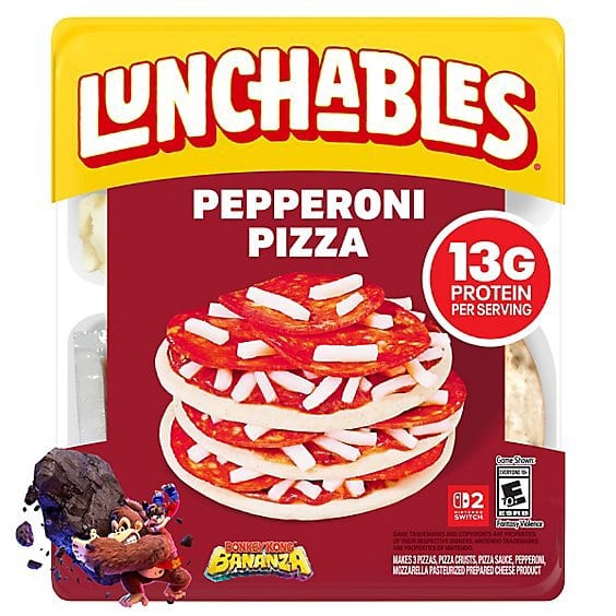 Lunchables Pepperoni Pizza tray showing stacked mini pizza crusts topped with pepperoni and shredded mozzarella