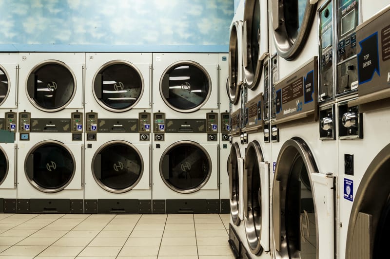 a laundromat has a machine that says dryer on it
