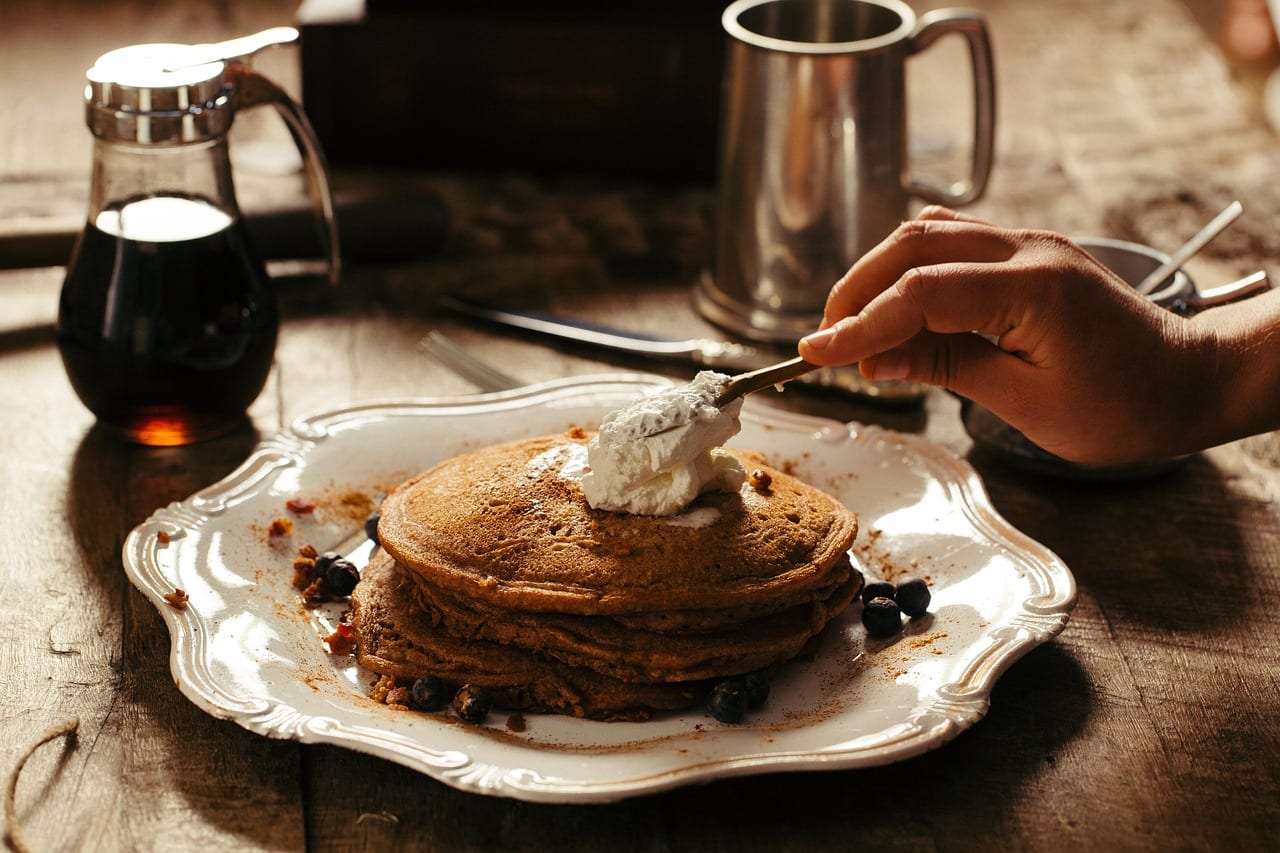 pancakes, whipped cream, breakfast, plate, breakfast plate, meal, breakfast meal, stack, stack of pancakes, food, table, food photography, eat