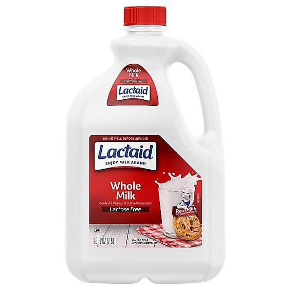 Lactaid Whole Milk 96 fl oz jug with red cap and label showing milk splash and cookies.